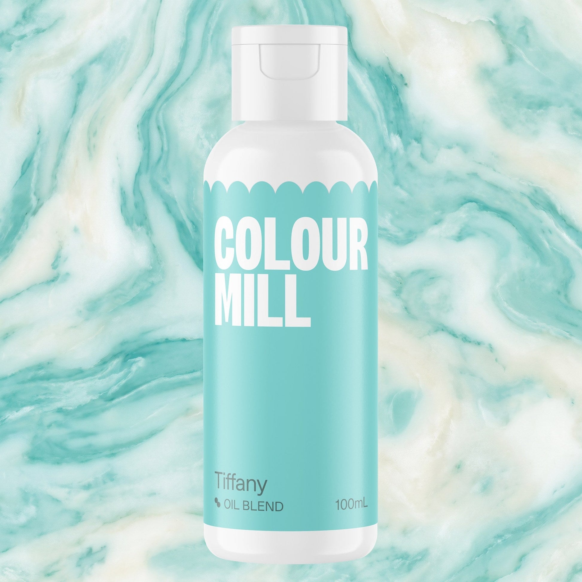 Colour Mill Tiffany 100ml oil based food coloring bottle on a marbled background