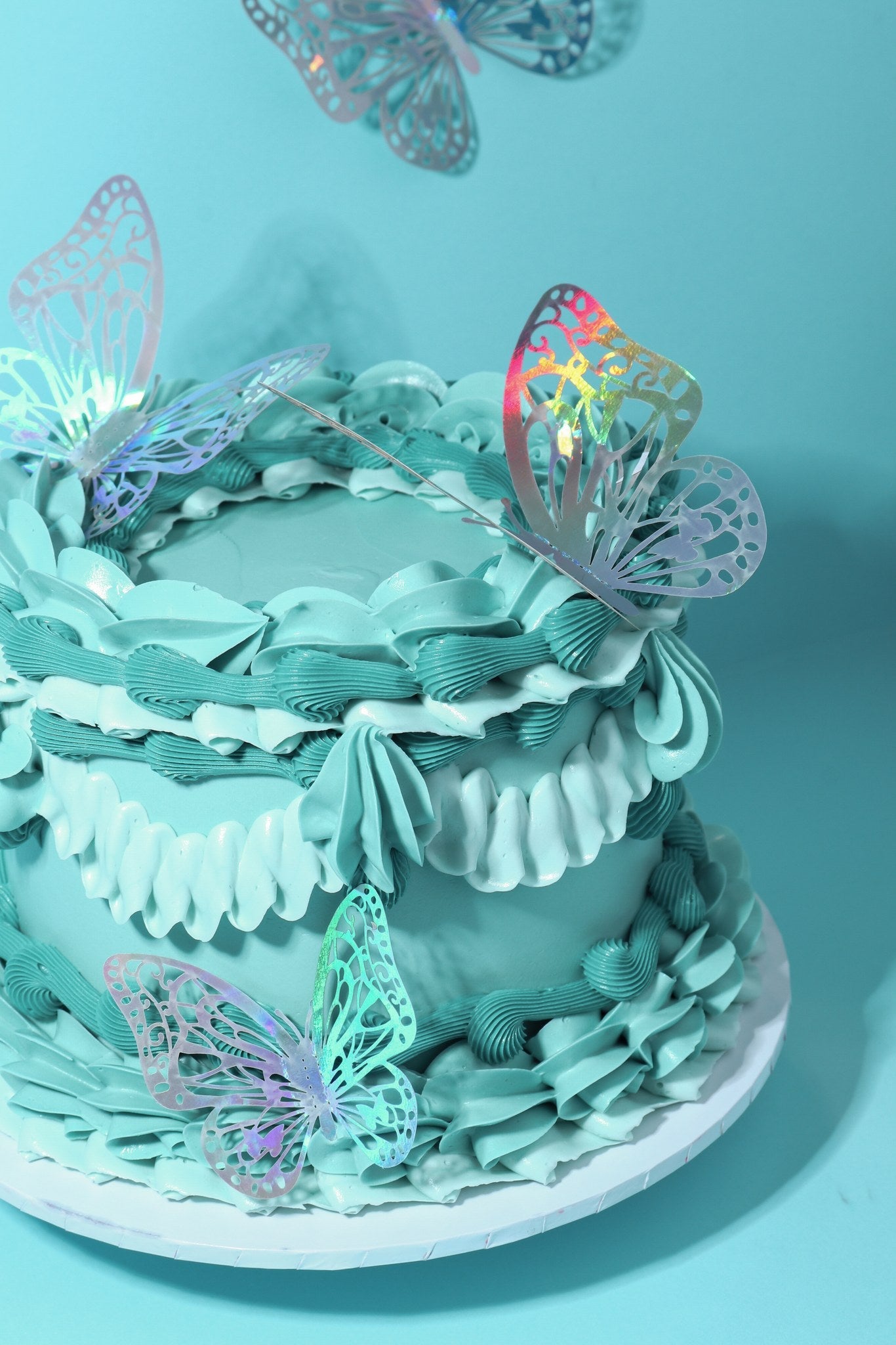 Cake decorated with buttercream colored using Colour Mill Tiffany oil based food coloring