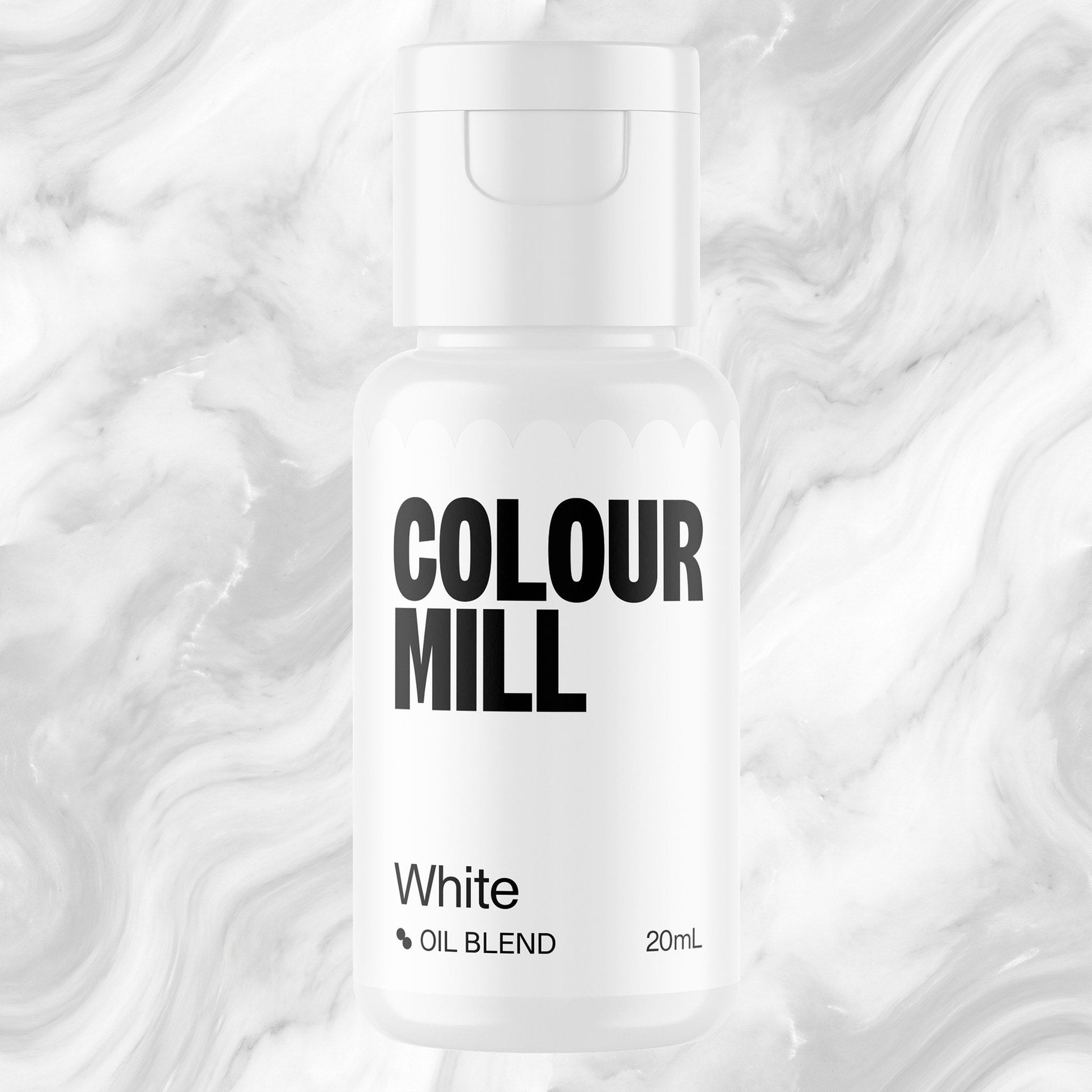 Colour Mill White 20ml oil based food coloring bottle on a marbled background