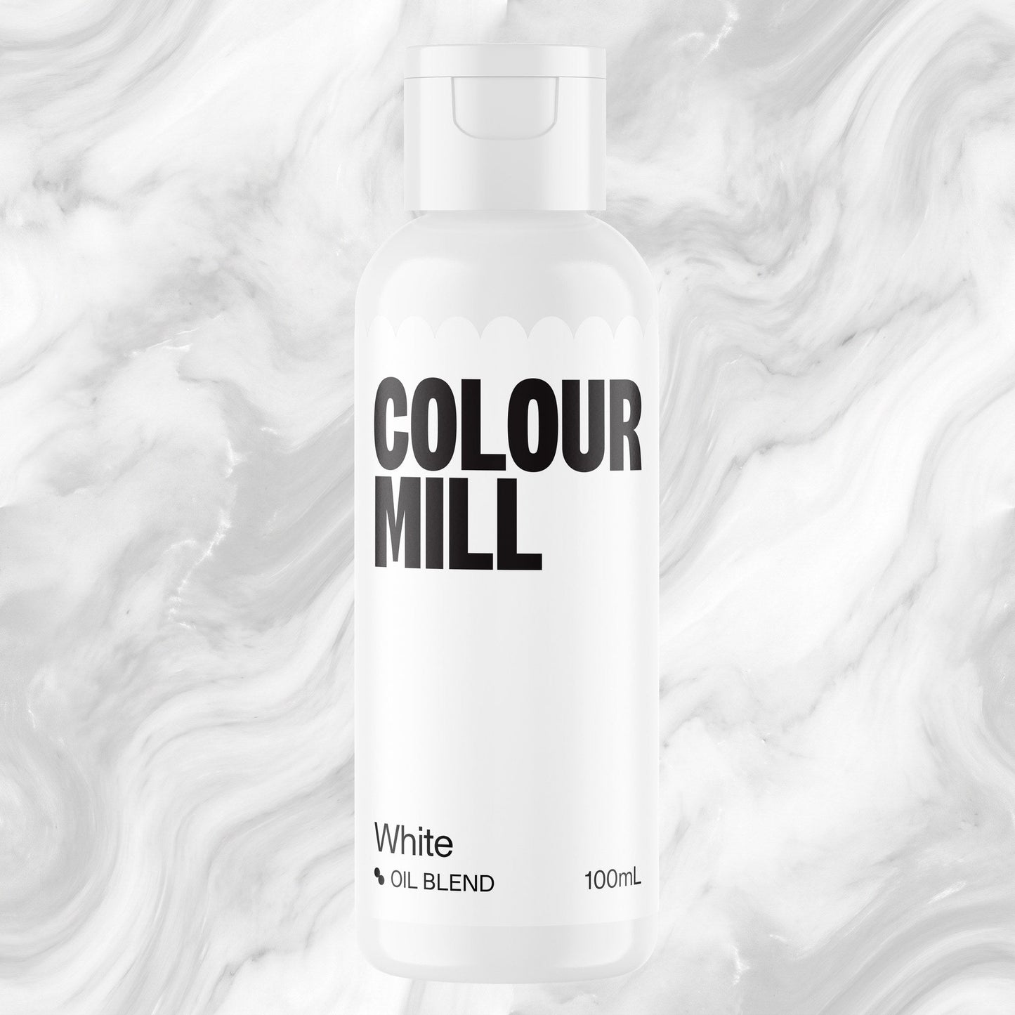 Colour Mill White 100ml oil based food coloring bottle on a marbled background