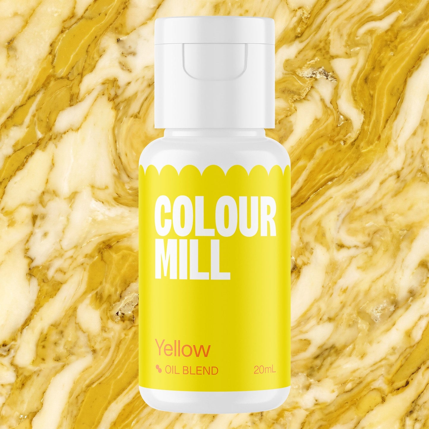 Colour Mill Yellow 20ml oil based food coloring bottle on a marbled background